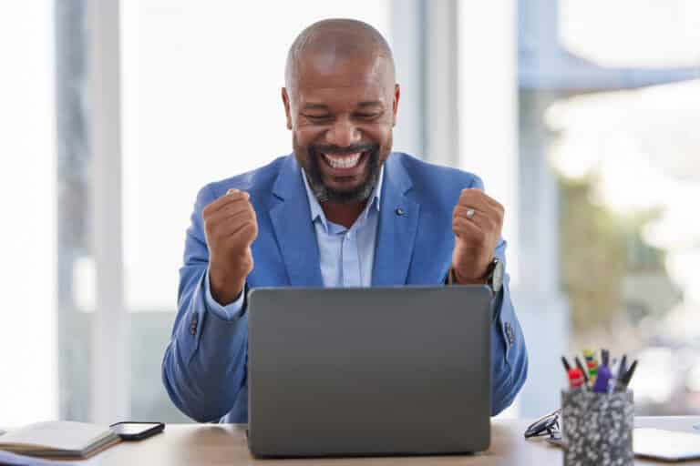 man happy about boosting website sales